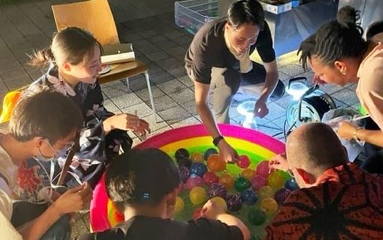 Enjoying water balloon fishing